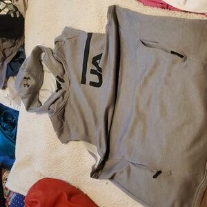 Sleeveless Under Armour hoodie with zip front pockets